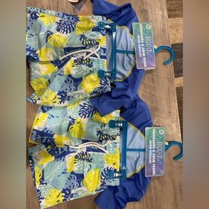 Size 2T bathing suit set with goggles.